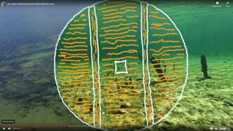 Visualisierung eines prähistorischen Wagenrades auf einer Unterwasser-Filmsequenz